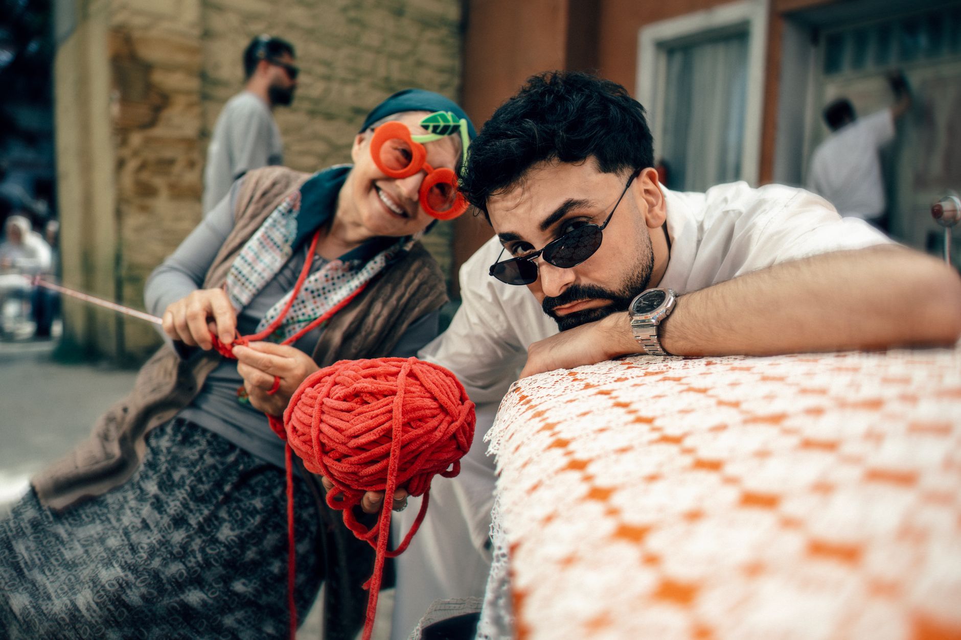 fun street knitting with red yarn